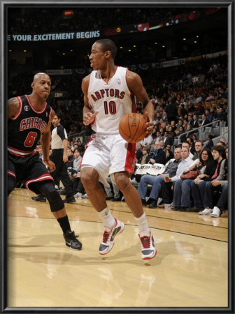 Chicago Bulls V Toronto Raptors: Keith Bogans And Demar Derozan by Ron Turenne Pricing Limited Edition Print image