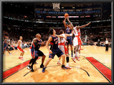 Atlanta Hawks V Toronto Raptors: Al Horford, Linas Kleiza And Amir Johnson by Ron Turenne Pricing Limited Edition Print image