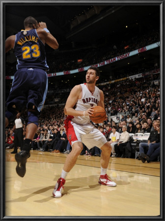 Denver Nuggets V Toronto Raptors: Andrea Bargnani And Shelden Williams by Ron Turenne Pricing Limited Edition Print image