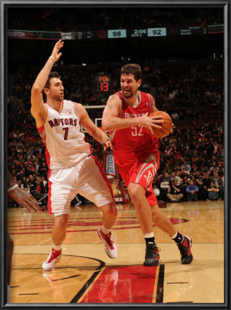 Houston Rockets V Toronto Raptors: Brad Miller And Andrea Bargnani by Ron Turenne Pricing Limited Edition Print image