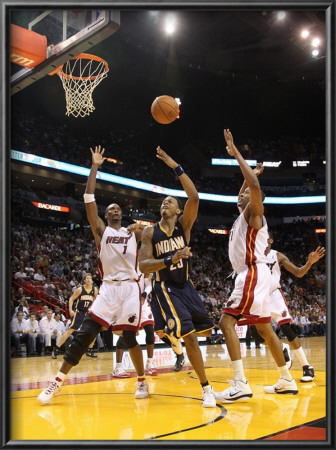 Indiana Pacers V Miami Heat: Brandon Rush And Chris Bosh by Mike Ehrmann Pricing Limited Edition Print image