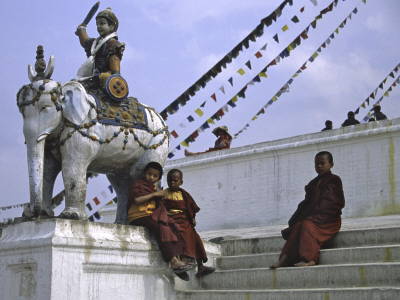 Children By Elephant Sculpture, Nepal by Michael Brown Pricing Limited Edition Print image