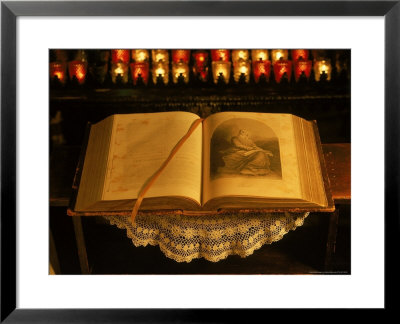 Open Bible And Prayer Candles In Background by Sylvia Bissonnette Pricing Limited Edition Print image