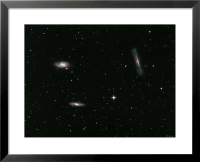 The Leo Triplet, Also Known As The M66 Group, Is A Small Group Of Galaxies In The Constellation Leo by Stocktrek Images Pricing Limited Edition Print image
