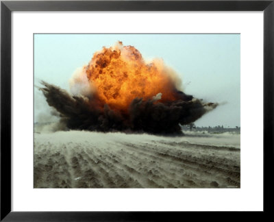 An Explosion Erupts From The Detonation Of A Weapons Cache by Stocktrek Images Pricing Limited Edition Print image