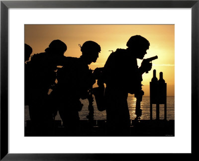 Marines Fire 9Mm Handguns On The Flight Deck Of Uss Peleliu by Stocktrek Images Pricing Limited Edition Print image