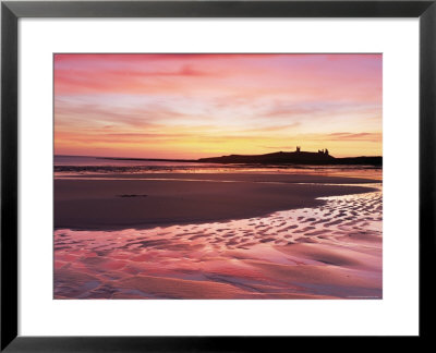 Embleton Bay At Sunrise, Low Tide, With Dunstanburgh Castle In Distance, Northumberland, England by Lee Frost Pricing Limited Edition Print image