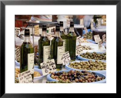 Olives And Olive Oil On Sale At A Market, Provence-Alpes-Cote-D'azur, France by Ruth Tomlinson Pricing Limited Edition Print image