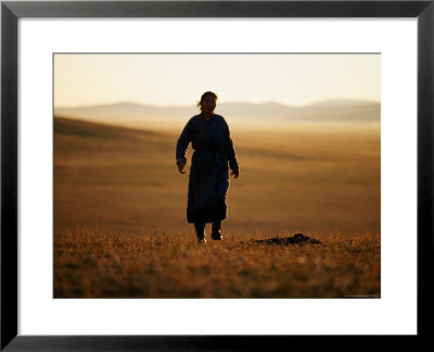 Mongolian Woman Walking Across The Steppe At Sunrise by Jerry Galea Pricing Limited Edition Print image