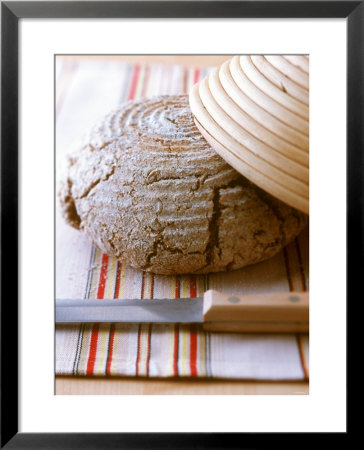 Wholewheat Bread With Round Bread Tin And Knife by Jörn Rynio Pricing Limited Edition Print image