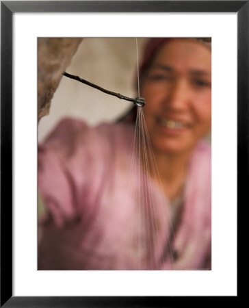 Uighur Woman Drawing Silk Thread From Cocoons, Silk Road, China by Keren Su Pricing Limited Edition Print image
