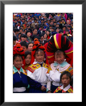 Miao Flower Girls In Traditional Costume Standing In Crowd, Nankai, China by Keren Su Pricing Limited Edition Print image