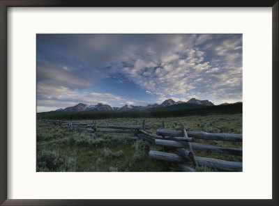 The Sawtooth Mountain Range Is A Backdrop For A Split-Rail Fence by Michael Melford Pricing Limited Edition Print image