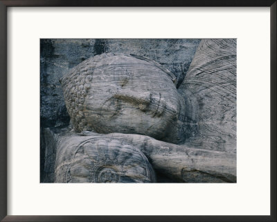 The Head Of A Forty-Four-Foot-Long Granite Statue Of A Reclining Buddha Entering Nirvana by Mattias Klum Pricing Limited Edition Print image