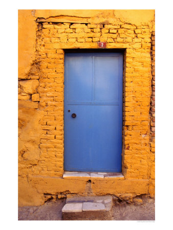 Blue Door On Yellow Brick House., Milas, Mugla, Turkey by Greg Elms Pricing Limited Edition Print image