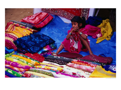 Girl At Flea Market Stall, Anjuna, India by Neil Setchfield Pricing Limited Edition Print image
