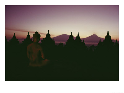A Buddha Sits In The Silence Amid 1200-Year-Old Stupas At Borobudur by Dean Conger Pricing Limited Edition Print image