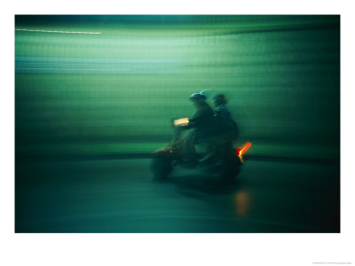 Panned Shot Of Two People On A Small Scooter by Michael S. Lewis Pricing Limited Edition Print image