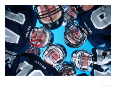 Young Football Players In A Huddle by Joseph D. Poellot Pricing Limited Edition Print image