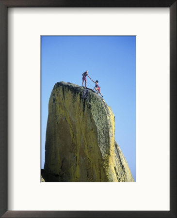 Rock Climber Helping Partner Onto Rock, Needle, Ca by Greg Epperson Pricing Limited Edition Print image