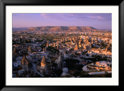 Tuff Towers And Village Houses In Afternoon Light, Goreme, Nevsehir, Turkey by Anders Blomqvist Pricing Limited Edition Print image