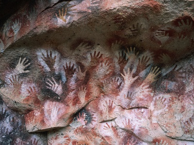 Cave Painting Of Hands Near Rio Pinturas by Hubert Stadler Pricing Limited Edition Print image