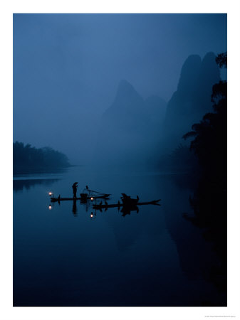Chinese Fisherman On Rafts Fishing With Cormorants, Li River, China by Howie Garber Pricing Limited Edition Print image