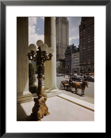 Handsome Cab Horse Drawn Carriage Waiting Outside Entrance Of The Plaza Hotel by Dmitri Kessel Pricing Limited Edition Print image