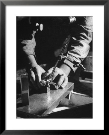 Close Up View Of A Man Working On A Machine by Carl Mydans Pricing Limited Edition Print image