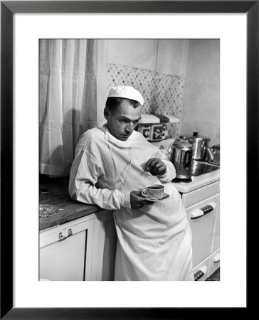 Dr. Ernest Ceriani In A State Of Exhaustion, Having A Cup Of Coffee In The Hospital Kitchen At 2 Am by W. Eugene Smith Pricing Limited Edition Print image