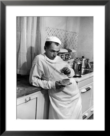 Dr. Ernest Ceriani In A State Of Exhaustion, Having A Cup Of Coffee In The Hospital Kitchen At 2 Am by W. Eugene Smith Pricing Limited Edition Print image