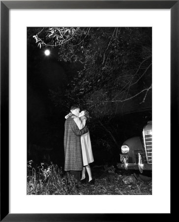 College Students Brooks Conrad And Merrilyn Olson Kissing At End Of Date by Alfred Eisenstaedt Pricing Limited Edition Print image
