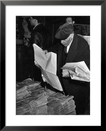 News Vendor Sorting Through Bundles Of The Jewish Daily Forward by Hansel Mieth Pricing Limited Edition Print image