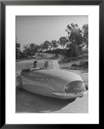 Young People Driving A Three Wheeled Auto by Nina Leen Pricing Limited Edition Print image