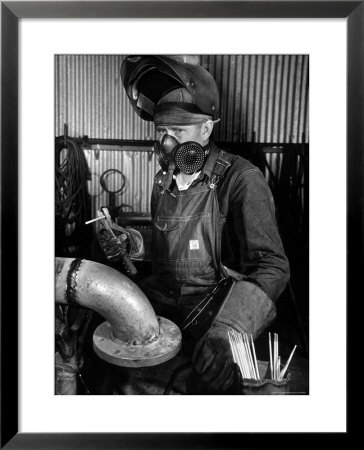 Welder Working In The Shipbuilding Industry by George Strock Pricing Limited Edition Print image