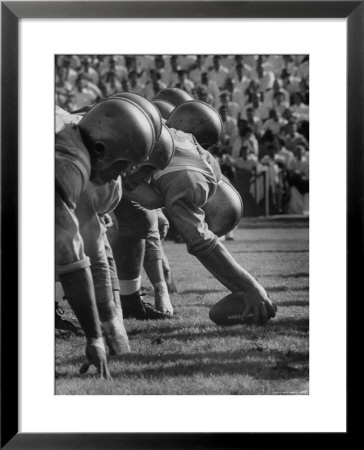Ucla Football Line Shown In Ucla Vs. Stanford Game by George Silk Pricing Limited Edition Print image