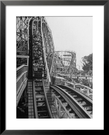 Thrill Seekers Getting A Hair Raising Ride On Cyclone Roller Coaster At Coney Island Amusement Park by Marie Hansen Pricing Limited Edition Print image