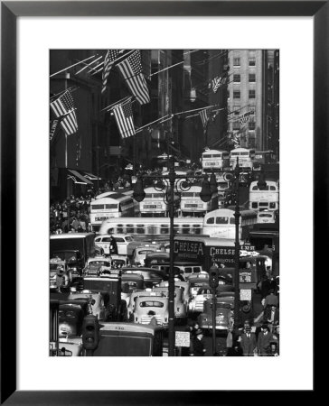 Pre-Christmas Holiday Traffic On 57Th Avenue, Teeming With Double Decker Busses, Trucks And Cars by Andreas Feininger Pricing Limited Edition Print image