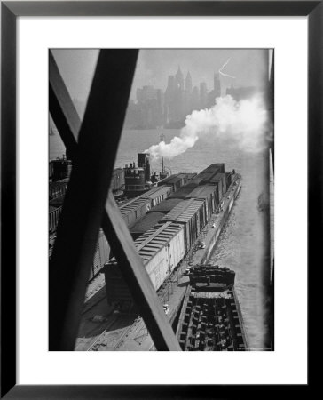 Tug Boats Muscling Barges Loaded With Lehigh Valley Railroad Freight Cars From New York City by Andreas Feininger Pricing Limited Edition Print image