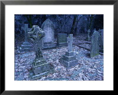 Frost On Headstones And Gravestones In A Graveyard At Ossington, Nottinghamshire, England by Mawson Mark Pricing Limited Edition Print image