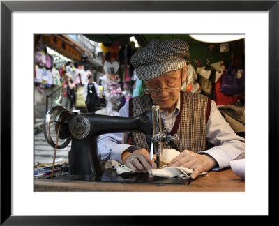 A Tailor At Work In Hong Kong, China by Andrew Mcconnell Pricing Limited Edition Print image