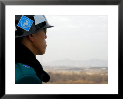 South Korean Rok Soldier In Joint Security Area Looking To The North Across Dmz, Seoul, South Korea by Anthony Plummer Pricing Limited Edition Print image