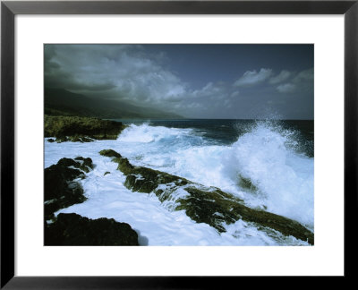 Surf Pounds On One Of Cuba's Rocky Coastlines Under A Stormy Sky by Steve Winter Pricing Limited Edition Print image