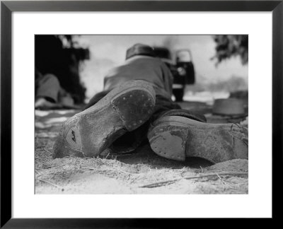 Close Up Of Worn Out Shoes Being Worn By Mexicans Who Crossed Border Into Us Illegally by Loomis Dean Pricing Limited Edition Print image