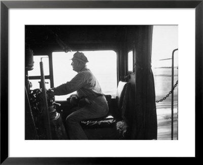 Engineer Aboard The 20Th Century Limited Riding In Cab With His Hand On The Engine Brake by Alfred Eisenstaedt Pricing Limited Edition Print image