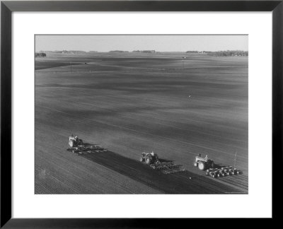 Farmers Planting Corn On Hamilton Farm by Michael Rougier Pricing Limited Edition Print image