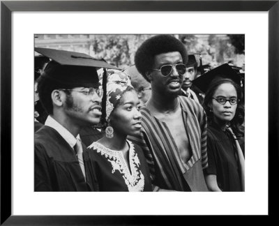 Graduating Africian Americans Wearing African Style Fashions At Howard University by Charles H. Phillips Pricing Limited Edition Print image