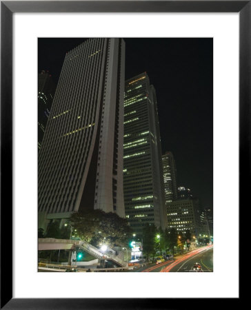 Car Trails At Night, Skyscrapers And City Buildings, Shinjuku, Tokyo, Japan by Christian Kober Pricing Limited Edition Print image