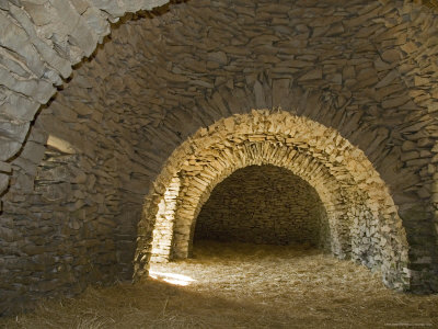 Interior Of An Old Stone Bergerie, Or Shepherd's Hut, In The Hills Of Provence, France by Stephen Sharnoff Pricing Limited Edition Print image