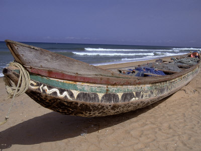 Keta Fishing Canoe On Keta Beach, Ghana by Bob Burch Pricing Limited Edition Print image